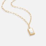 Golden Pages Necklace